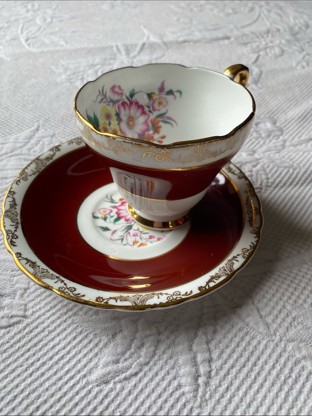 Porcelain Teacup and Saucer Set in Red with Gold Trim
